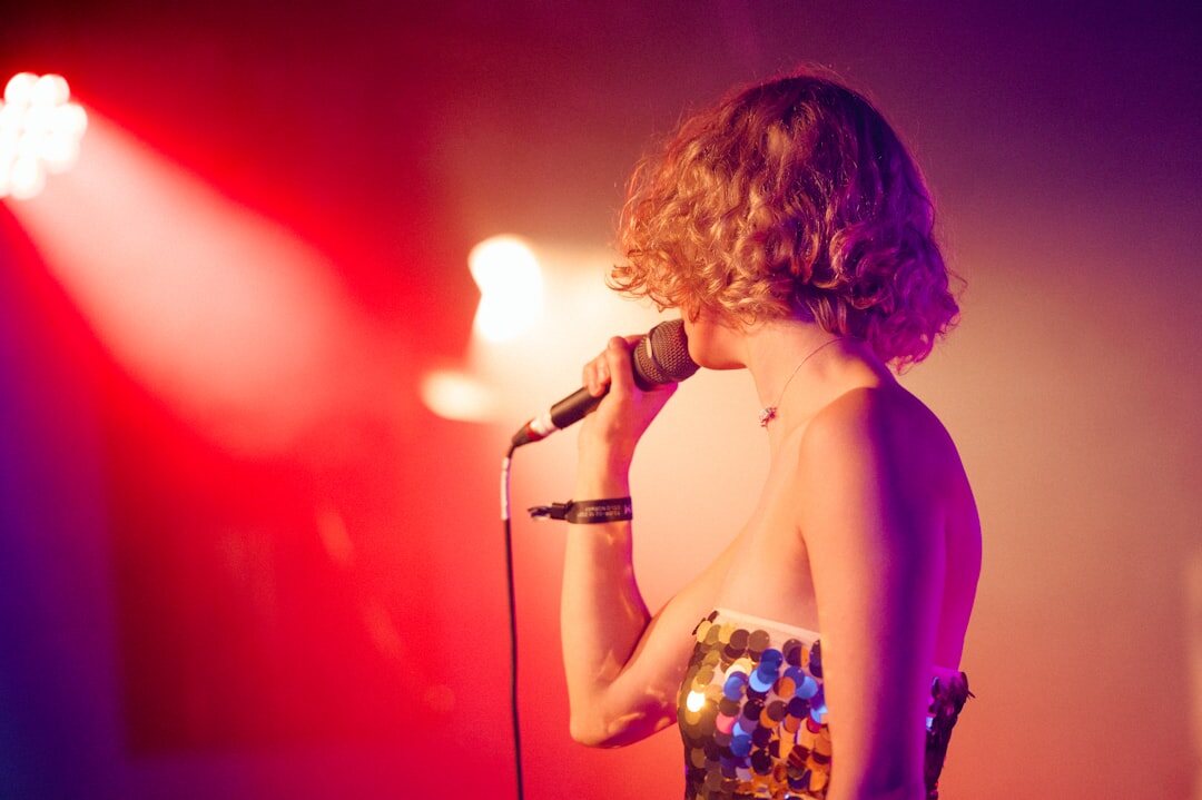 singer performing on stage
