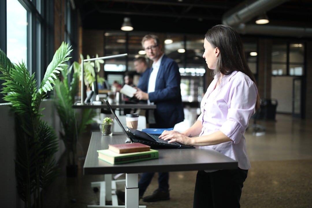 Editorial team working in a bright newsroom office