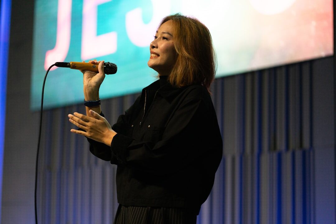 actress on stage accepting award