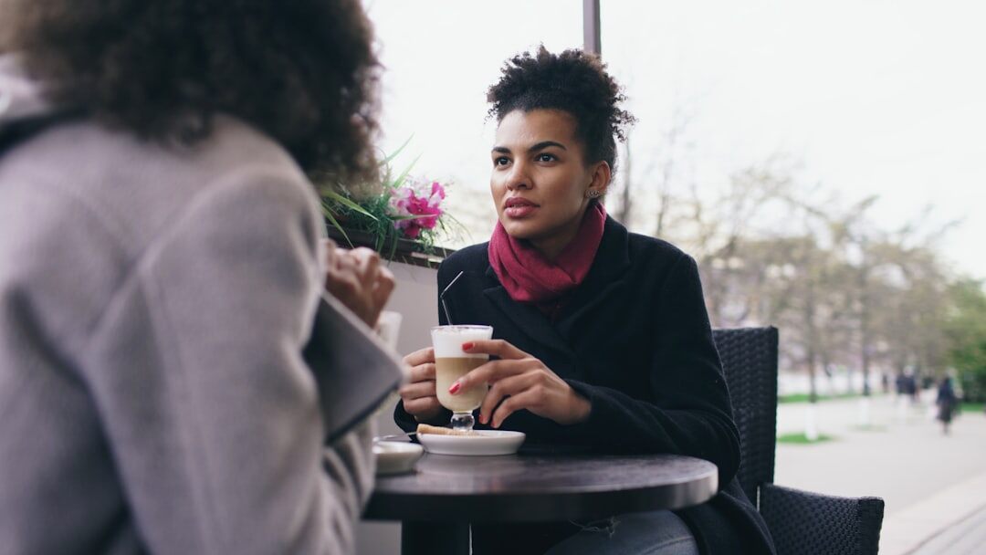woman giving interview in cafe